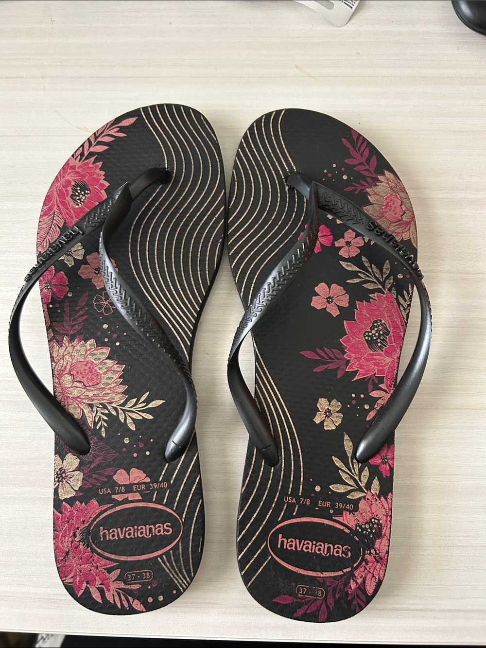 Havaianas Black Flip Flops with Pink Floral Print